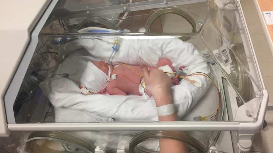 George as a small baby in hospital